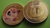 106881294-1620749189576-gettyimages-1232802276-Dogecoin.jpg