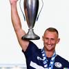 DALL·E 2022-08-10 10.16.53 - Joel Selwood holding up the AFL premiership cup in 2022.png