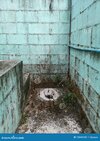 dirty-abandoned-inhospitable-squat-toilet-thailand-133431531.jpg