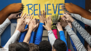 bears hands on believe sign.png