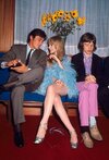 Alain Delon, Marianne Faithfull, and Mick Jagger at a party in 1968.jpg