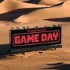 Arid desert with a huge billboard with “Baghdad presents -Game Day” in black and red theme .jpeg