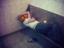 U2 in urinal sleeping.png