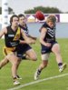 R07-11 Burnie player Samuel Rice boots the ball into attack in the game against Hobart.jpg