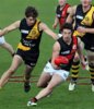 R09-11 North Launceston\'s Callen Young skips away from his Hobart opponents.jpg