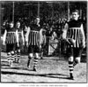 617px-John_Londrigan_leading_Port_Adelaide_onto_Adelaide_Oval_on_May_2_1914.jpg