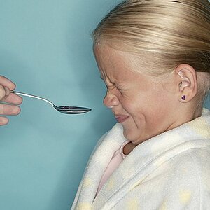 girl-taking-medicine-spoon.jpg