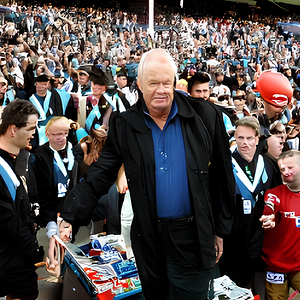 craiyon_105639_A_dishevelled_Port_Adelaide_Power_football_coach_Ken_Hinkley_leaves_Alberton_Ov...png